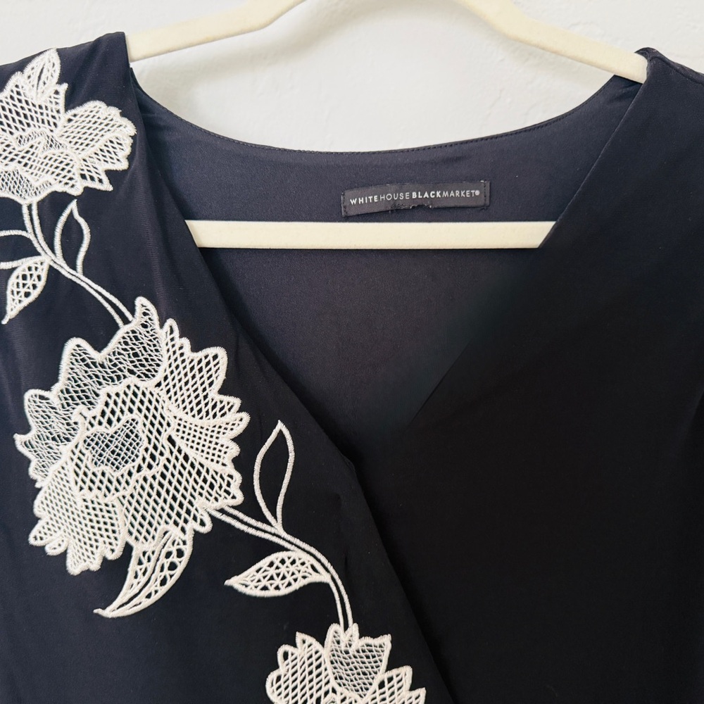 Black Sleeveless Top with White Floral Embroidery - Picture 2 of 6